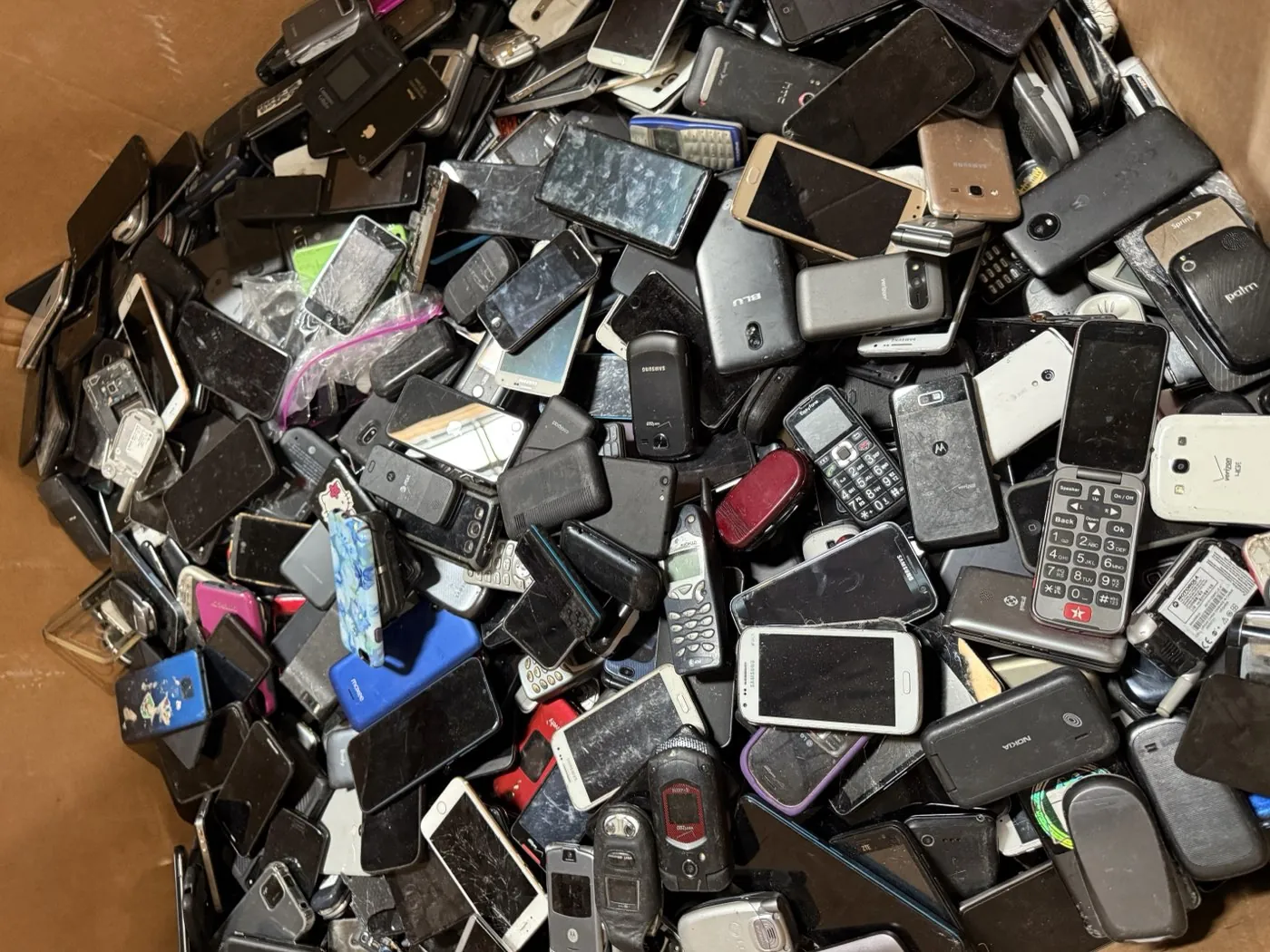 Boxes of used mobile phones